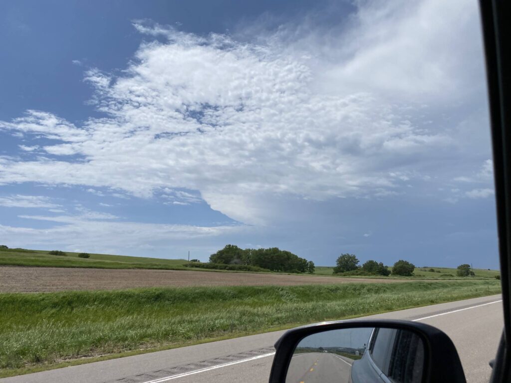 Big old anvil behind that altostratus.